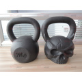 Fundición de hierro personalizado OEM Sculpted Ape cráneo en forma de Kettlebell con la cara